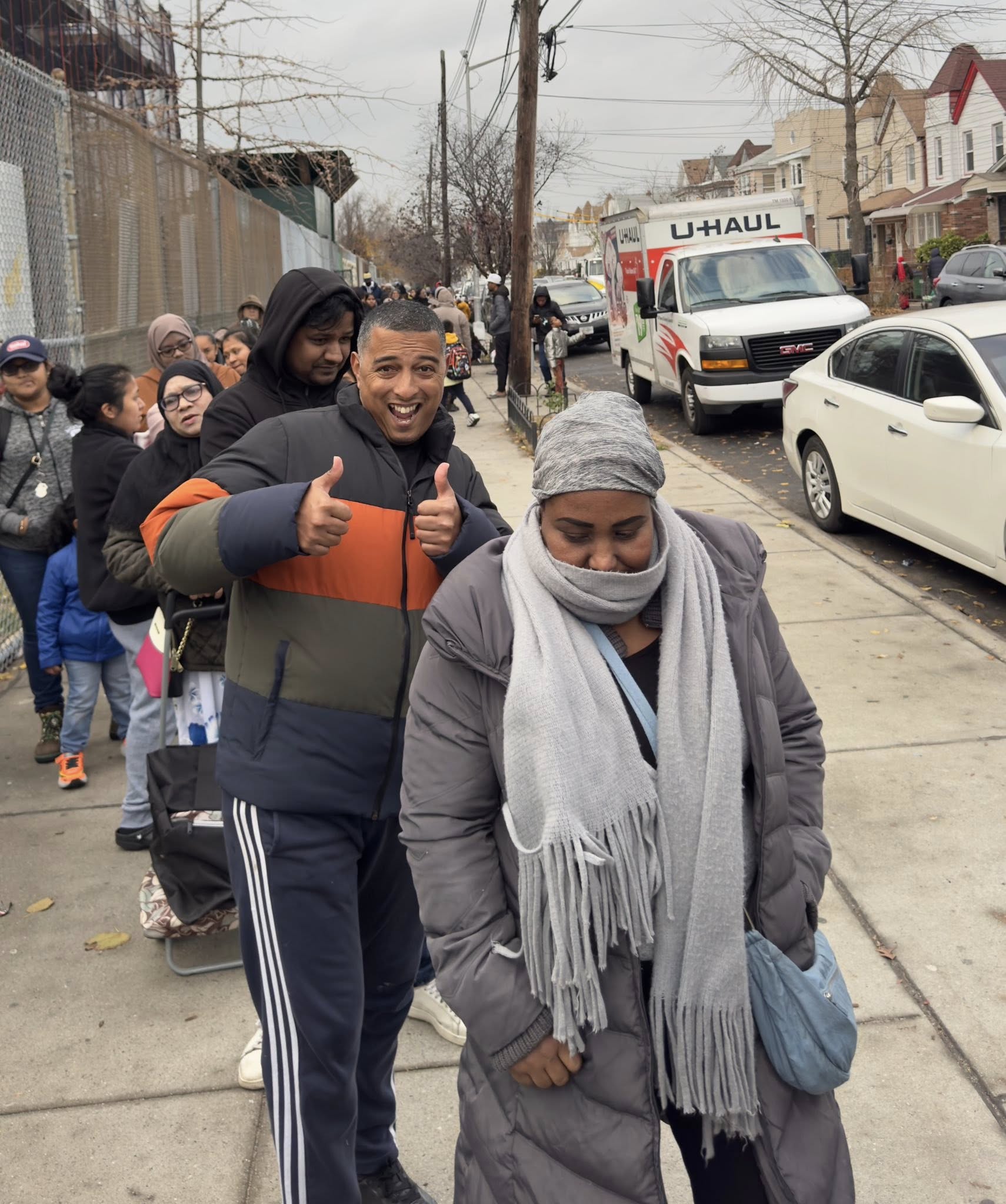 APAG Cares volunteers distributing food packages