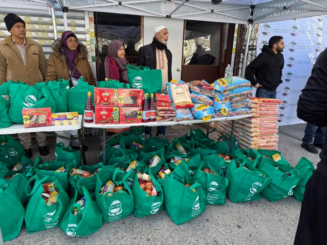 APAG Cares volunteers preparing food support under community tents
