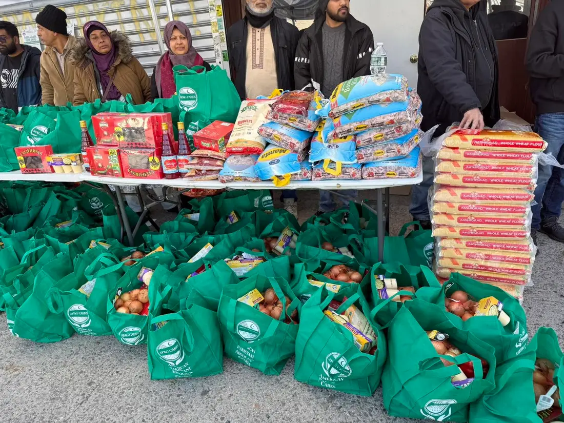 APAG Cares green food bags and grocery staples prepared for Ramadan distribution