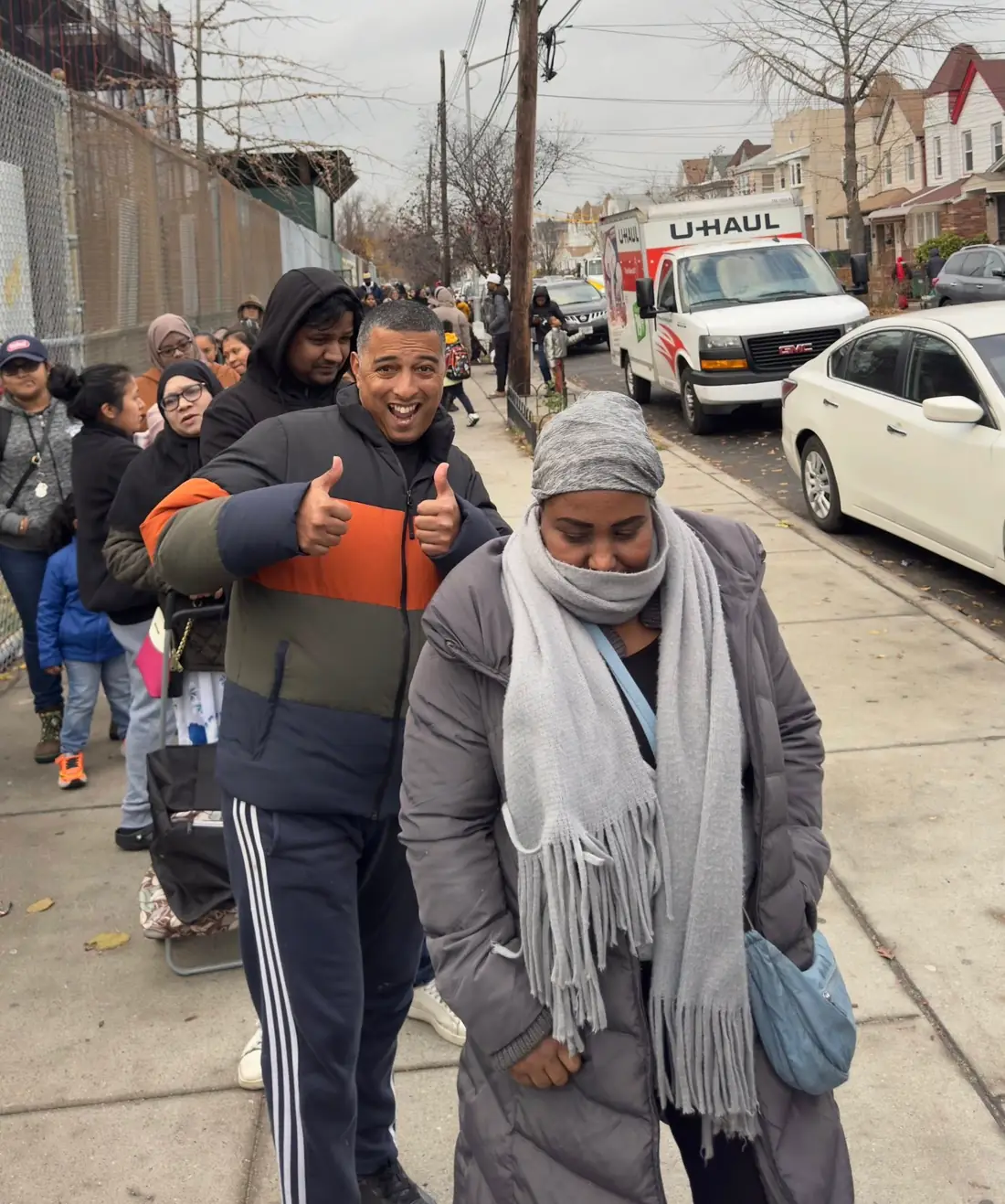 APAG Cares volunteers distributing food packages